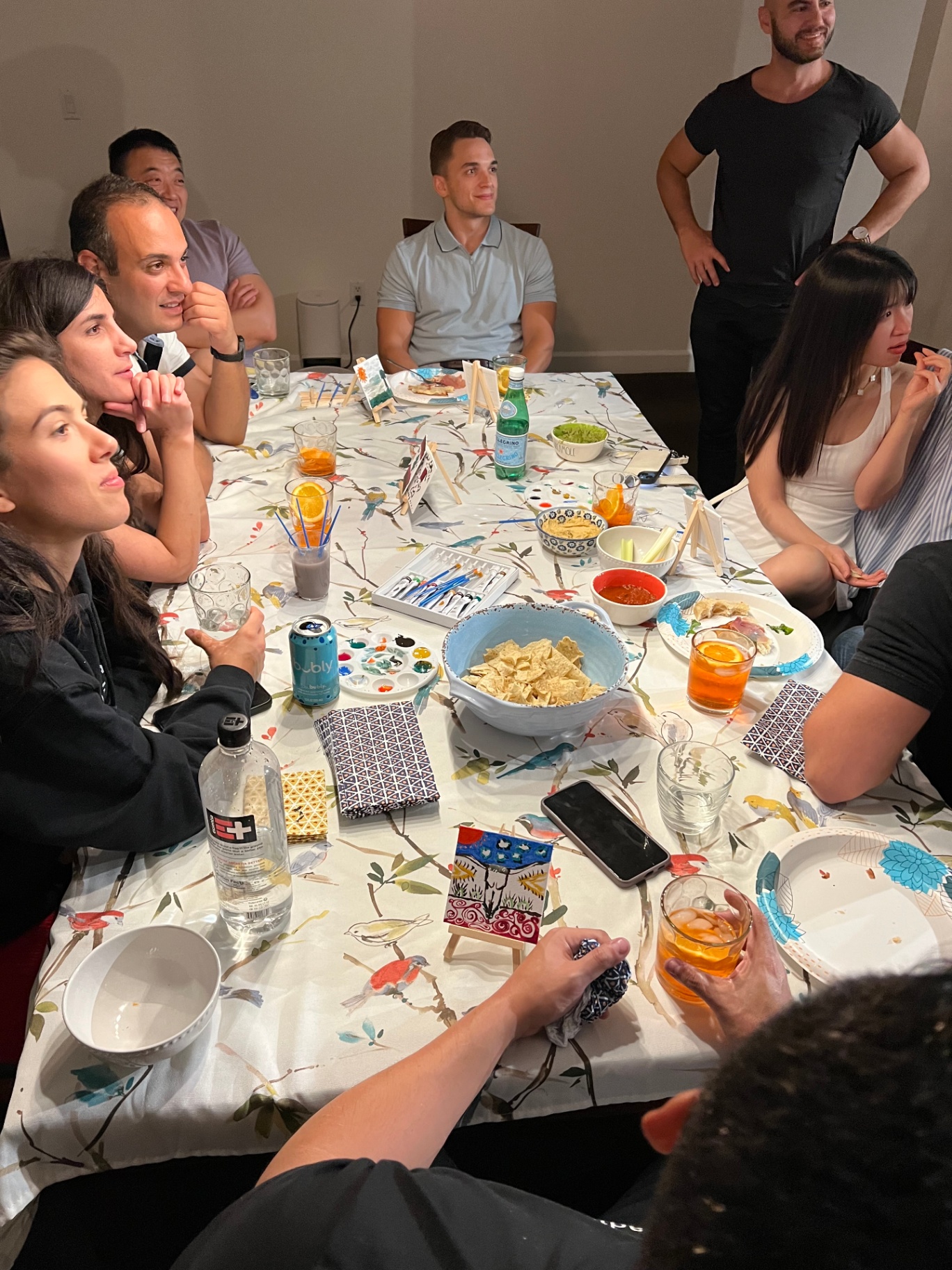 Friends around the table painting